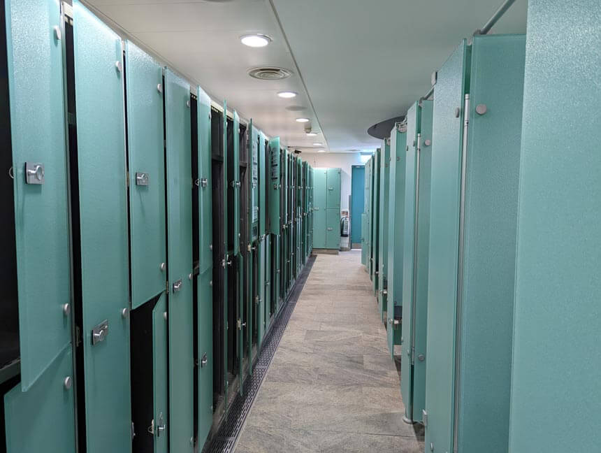 The changing cabins (on the right) and lockers (on the left) at Thermae Bath Spa)