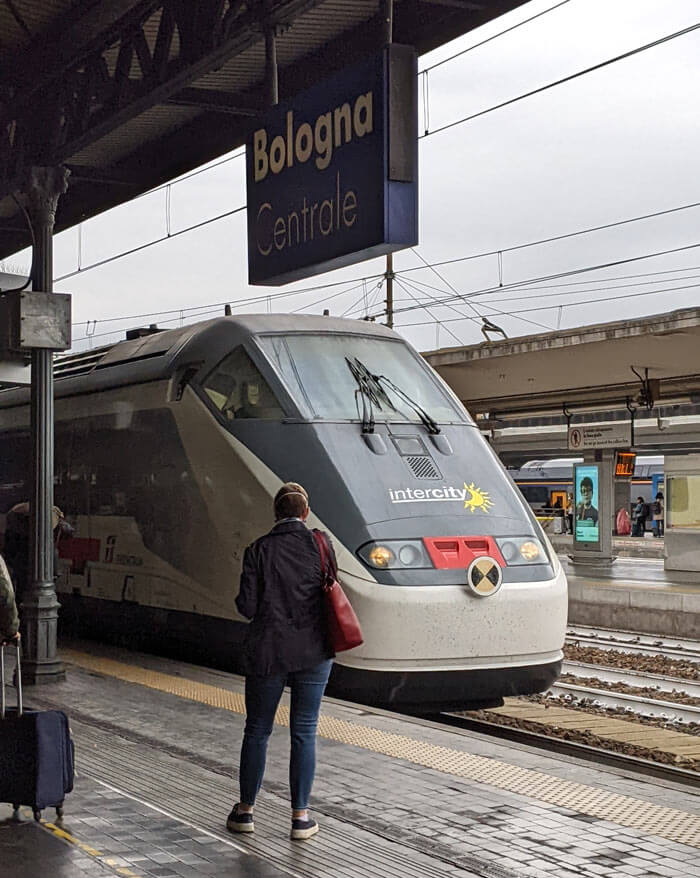 Catching a train to Rimini at Bologne Centrale station.