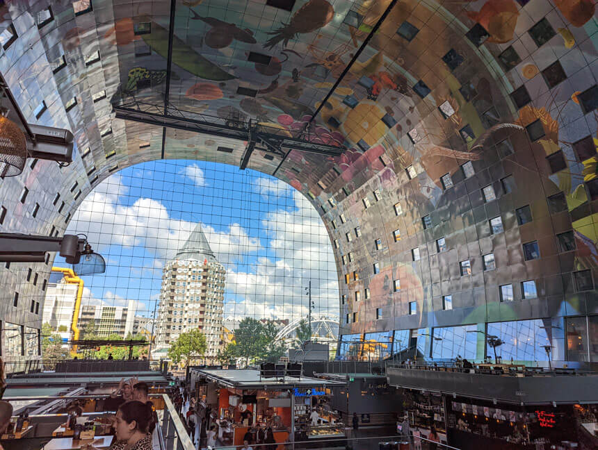 Inside Markthal. A huge mural covers the whole roof.