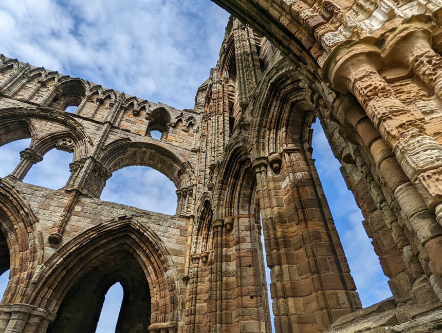 Looking up at the Gothic arches of Whitby Abbey, one of the best things to do in Whitby