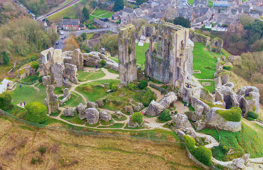 Visiting the village of Corfe Castle, with its romantic ruin and picturesque streets is one of the best things to do on a trip to the Jurassic Coast - and you can stay here too