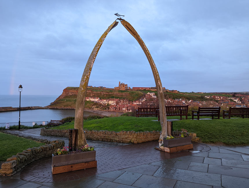 The Whale Bone Arch on Whitby's West Cliff at sunset