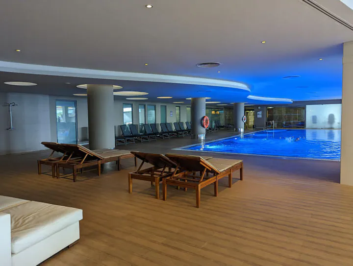 The indoor pool at the Enotel Lido hotel in Funchal. The spa and gym are behind the pool.