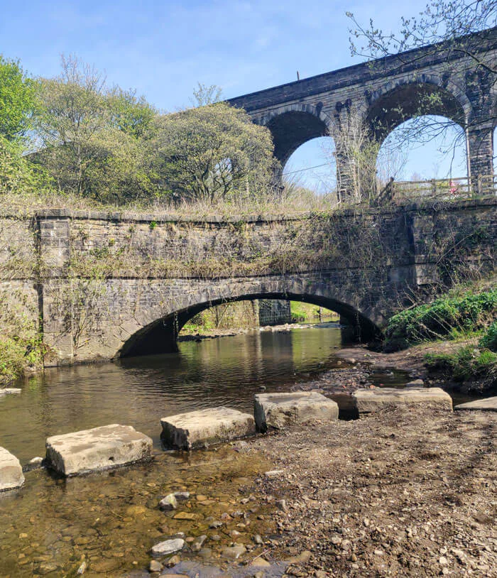 The stepping stones underneath the viaduct and canal aqueduct