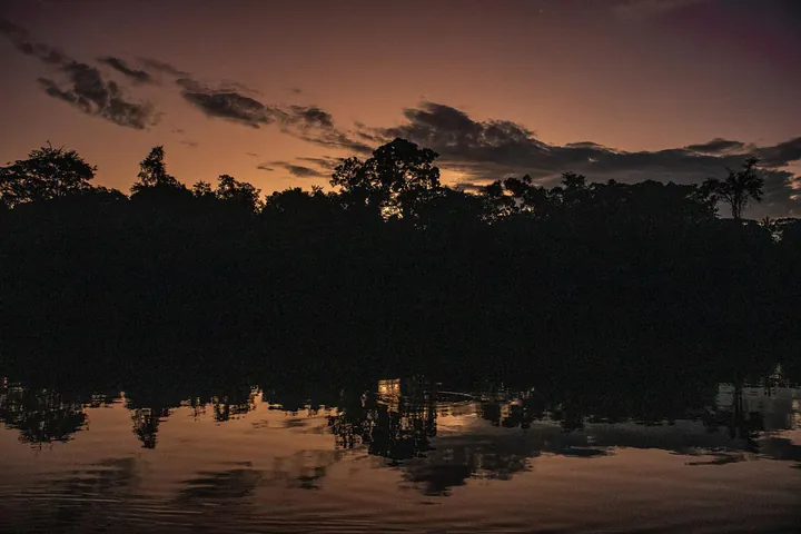 Sunset at Sandoval Lake in Tambopata National Reserve, Peru