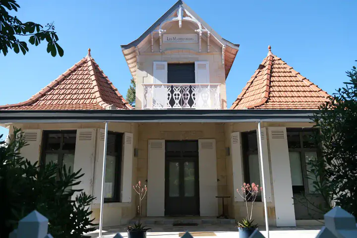 A beautiful, very symmetrical villa with ornate details