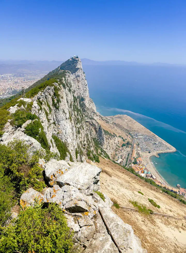A sharp, jagged cliff above the coast