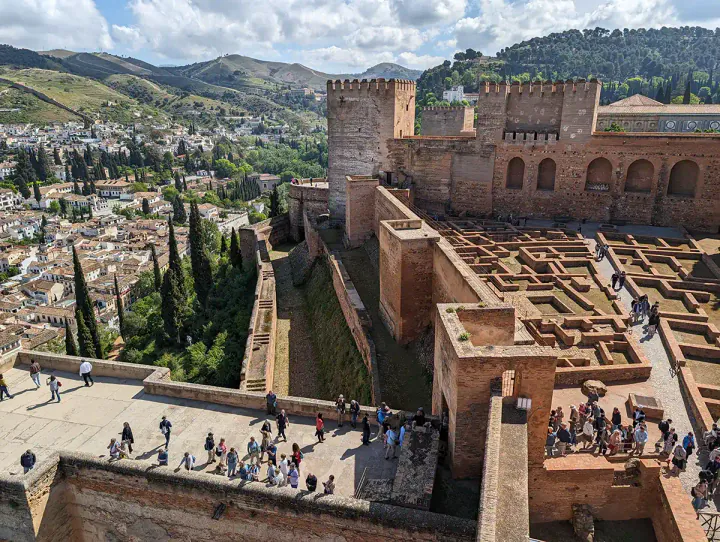 The Alcazaba in Granada is part of the Alhambra complex. The Alcazaba is a partially ruined but still very imposing fortress, high on a hill in Granada.