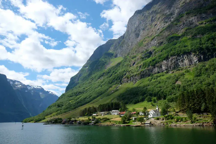 The quaint village of Dyrdal with its pretty white church is one of the most beautiful parts of the Nærøyfjord