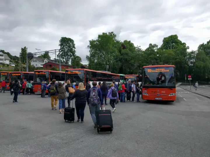 Norway in a Nutshell buses waiting at Voss