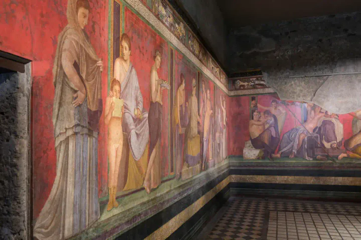 A brightly-coloured fresco at the Villa of the Mysteries