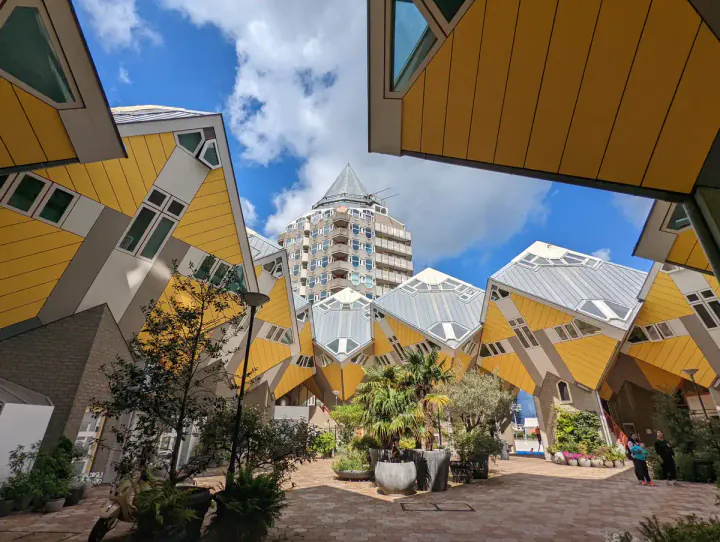 The cube houses in Rotterdam - giant yellow cubes set on one point and with windows in their sides are set around a paved courtyard