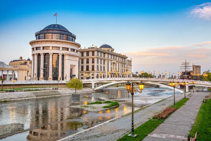 Grand modern buildings by a river