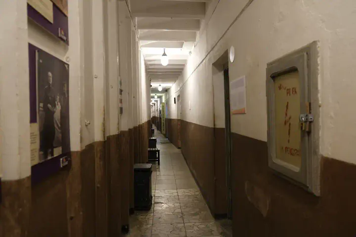 A corridor in the Bunk'Art 2 underground museum. Doors lead off the corridor into exhibition spaces