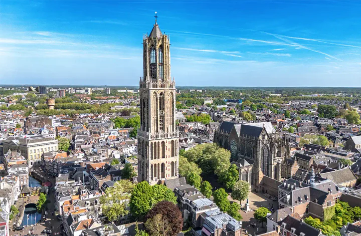 The historic city from Utrecht from above, with the Dom Tower rising way above eeverything.