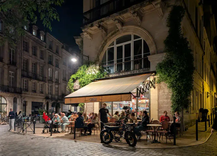 A bar in Bordeaux, packed with people enjoying an evening out