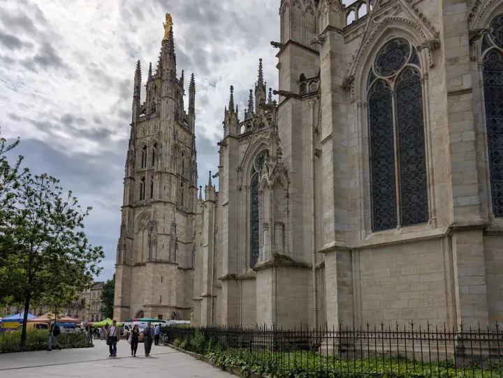 A large, stone cathedral with a separate bell tower