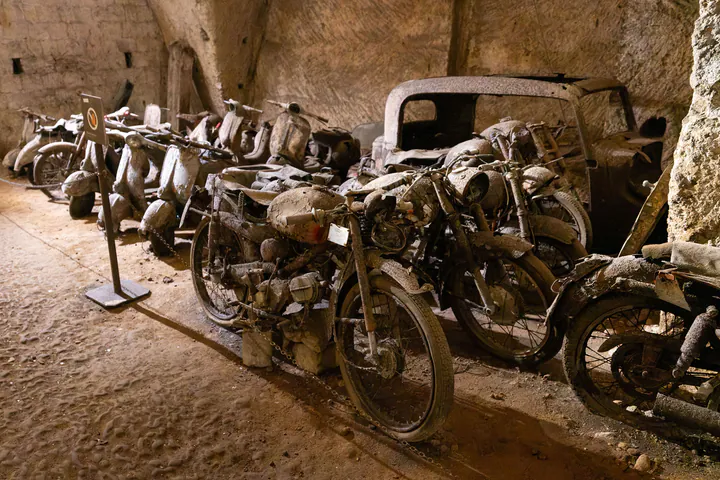 Old cars and motorcycles in the tunnels