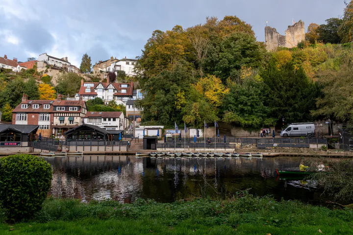 A view of the Marigold Cafe and boat hire, with Knaresborough Castle on the hill above