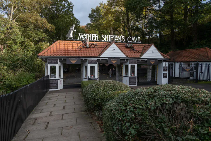 The entrance to Mother Shipton's Cave. The roof of the ticket office has giant spiders on it for Halloween