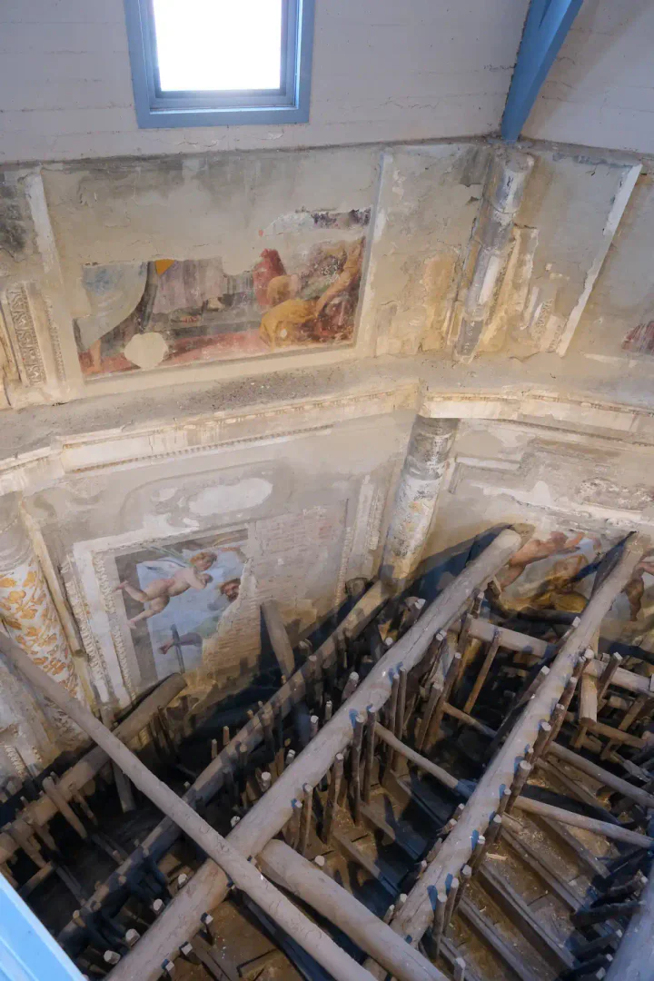Frescoes that had been hidden away for generations, plus the forest of wooden supports that holds up the Cathedral's ornate dome.