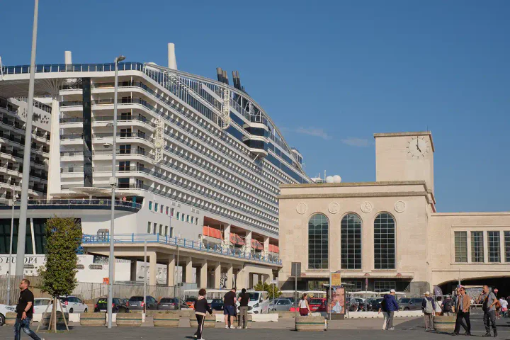 Naples cruise port, with a large cruise ship docked
