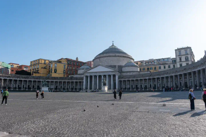Piazza Plebiscito is a grand square, framed by a graceful curved colonnade