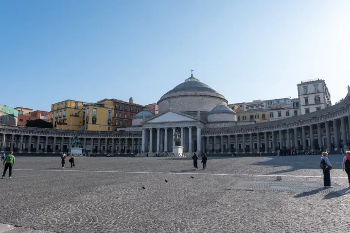 Piazza Plebiscito is a grand square, framed by a graceful curved colonnade