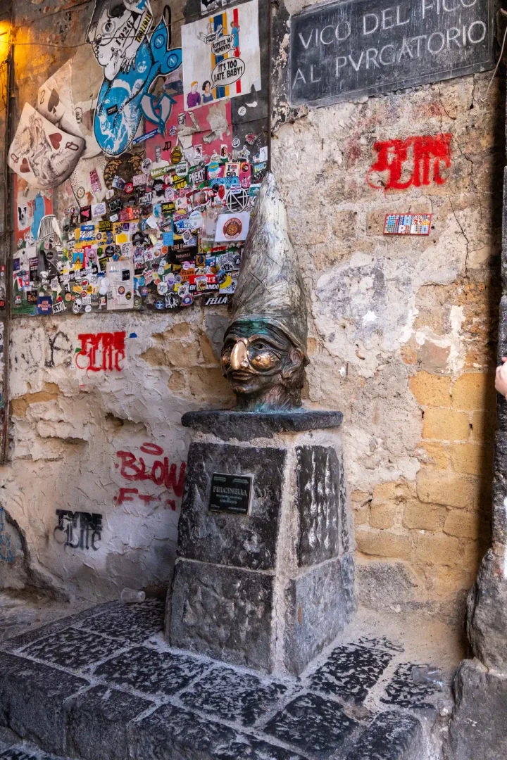 The Pulcinella bust. You can rub his nose for good luck.