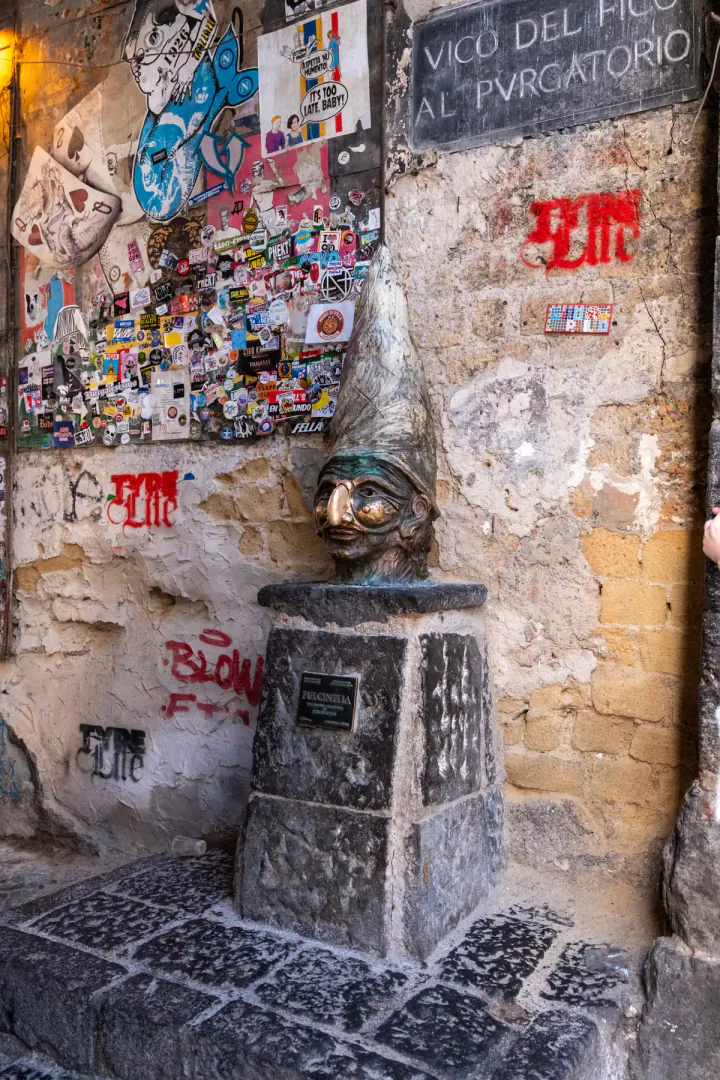 The Pulcinella bust. You can rub his nose for good luck.
