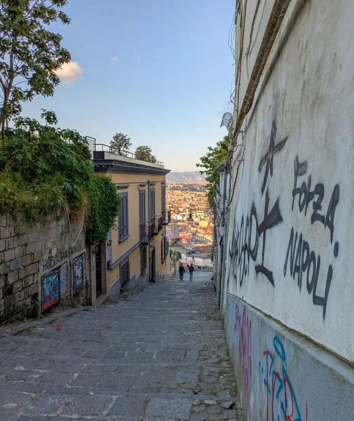 Forza Napoli football graffiti on a wall in Vomero