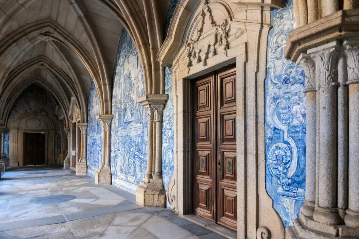 Blue and white tiles in the Gothic cloisters of Porto's cathedral