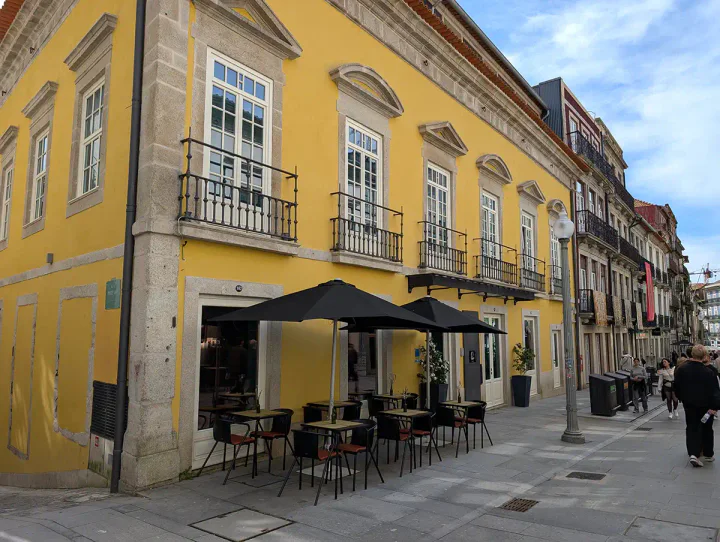 A grand old building on a pretty street