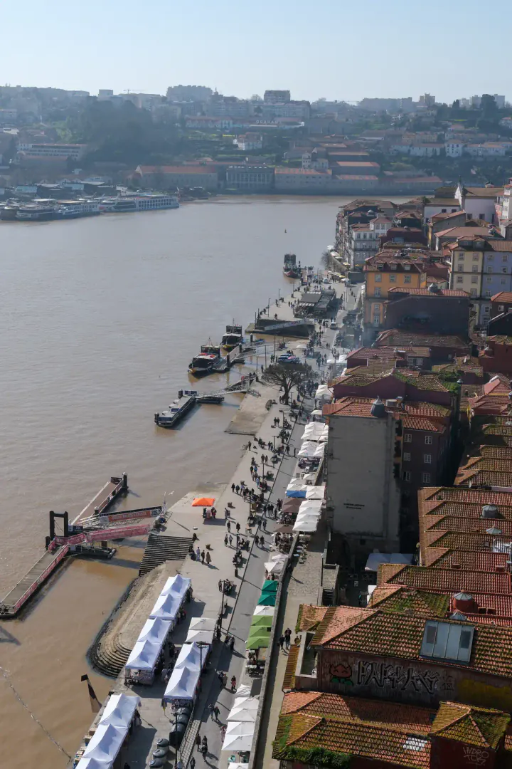 Looking down on the red roofs of the Ribeira district from the Luis I Bridge - a free activity in Porto