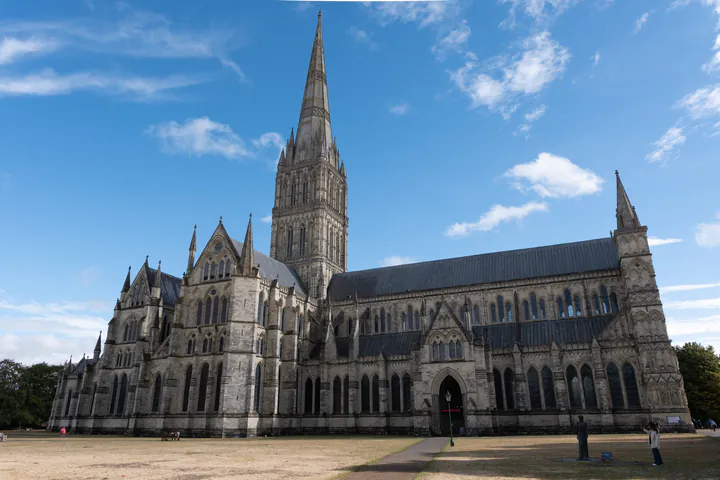 A large Gothic cathedral against a blue sky
