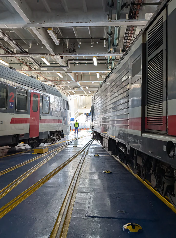 The two sides of the train loaded onto the ferry deck and ready to leave.