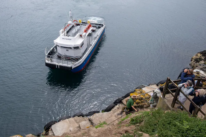 An empty boat leaving the island