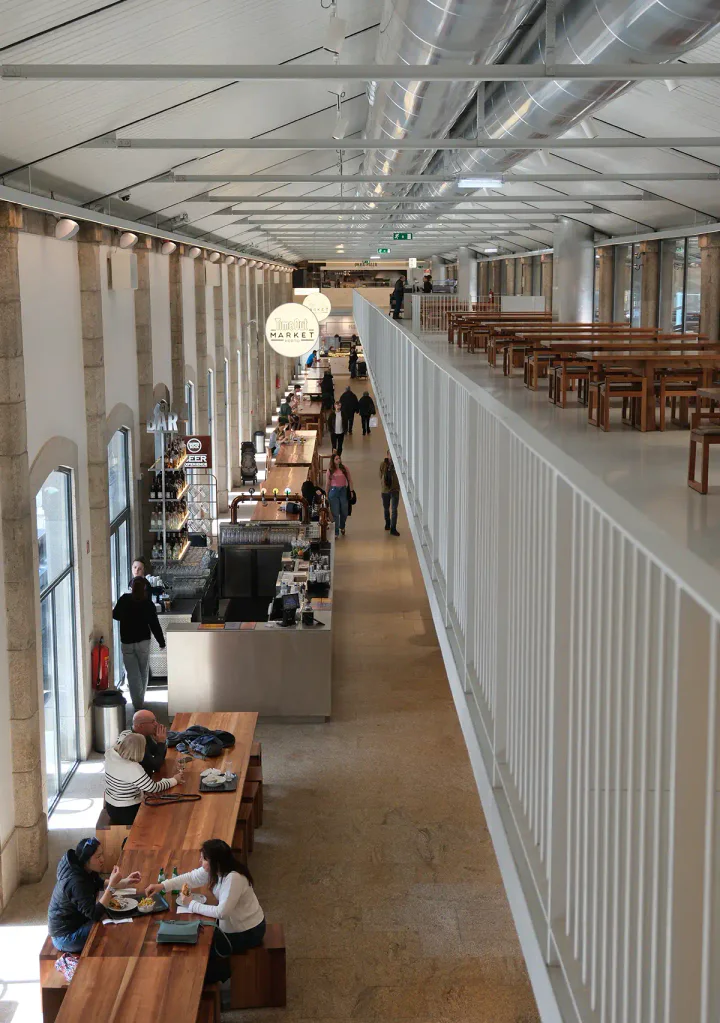 A large, airy hall with tables to eat at
