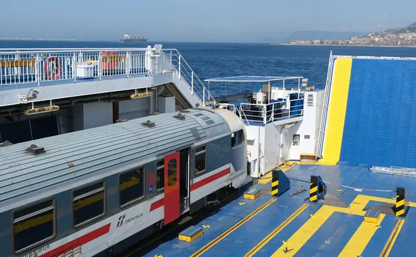 The Naples to Sicily train on a ferry in the middle of the Strait of Messina