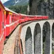 Compare the Bernina Express vs regional trains on the Bernina and Albula lines. Find the ideal choice for your scenic rail adventure with tips for your journey.