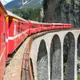 Compare the Bernina Express vs regional trains on the Bernina and Albula lines. Find the ideal choice for your scenic rail adventure with tips for your journey.