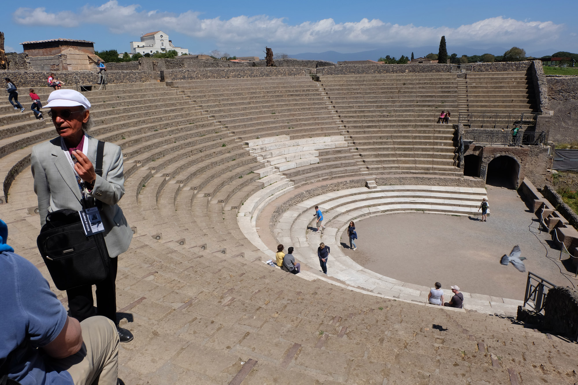 Our guide telling us about the theatre in Pompeii