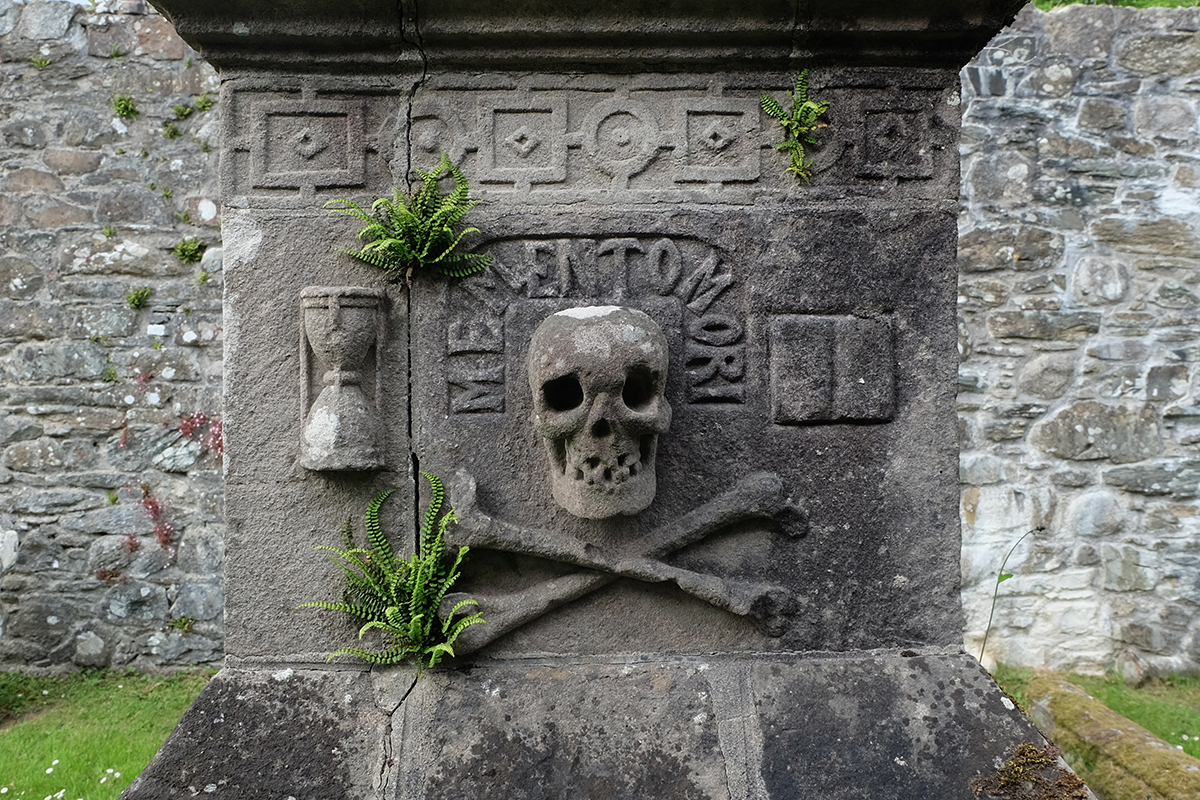 Skull and crossbones gravestone inside the ruined kirk at Anwoth