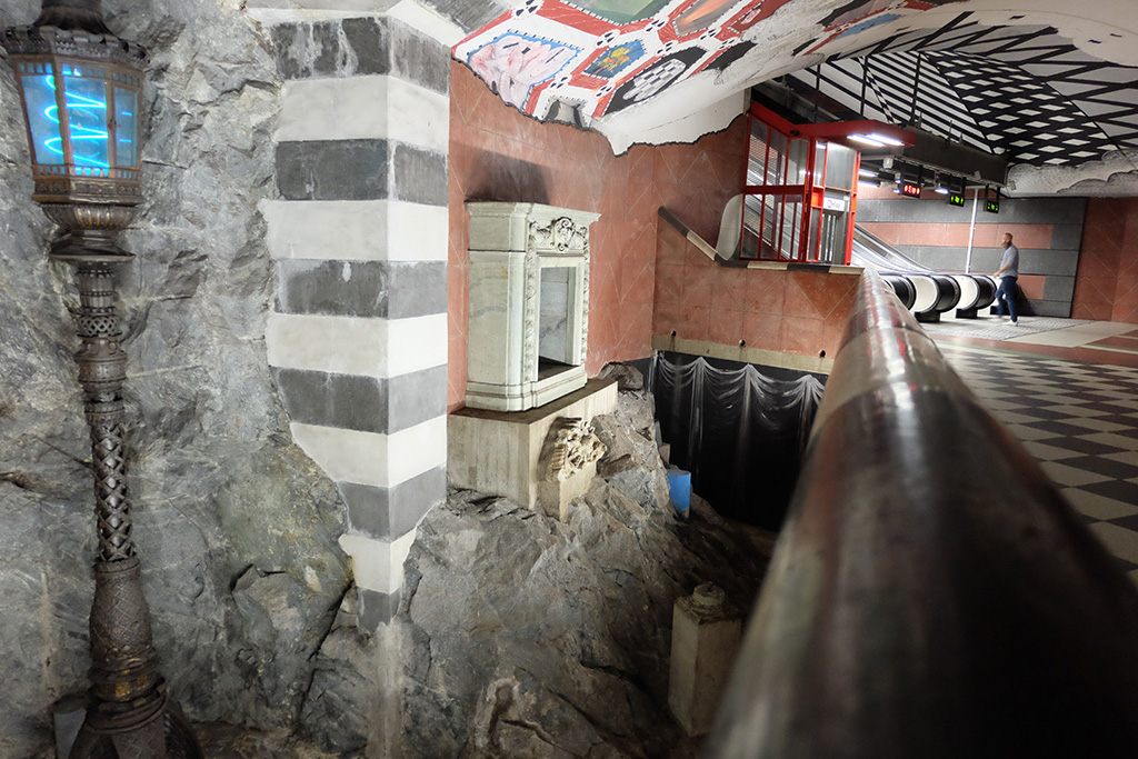 Bits of demolished buildings from the area, displayed as if they've been dug out of the earth