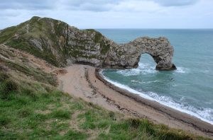 The Durdle Door arch (with a person for scale)