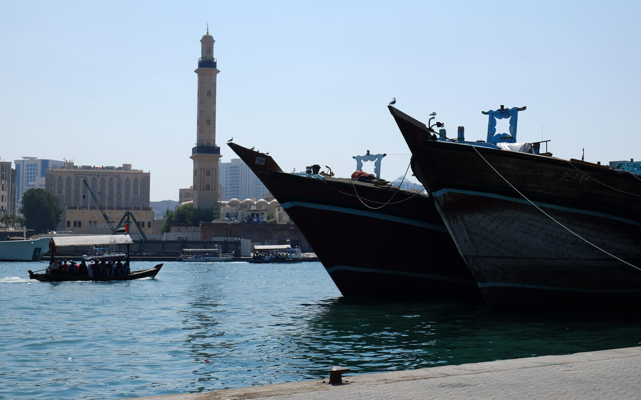 Dhows moored on the bank of the Dubai Creek