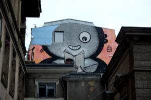 Bookworm street art on the roof of Carturesti Verona