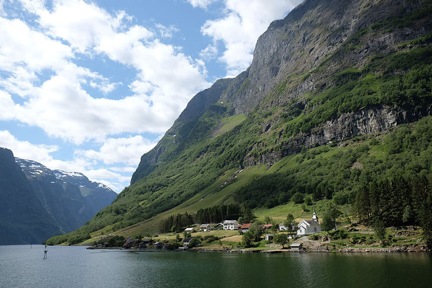 The quaint village of Dyrdal with its pretty white church is one of the most beautiful parts of the Nærøyfjord