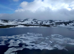 Crossing the stunning Hardangervidda plateau. Even in June it's covered in snow and ice.