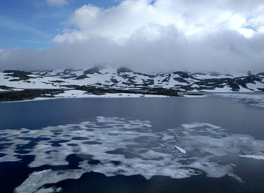 Crossing the stunning Hardangervidda plateau. Even in June it's covered in snow and ice.